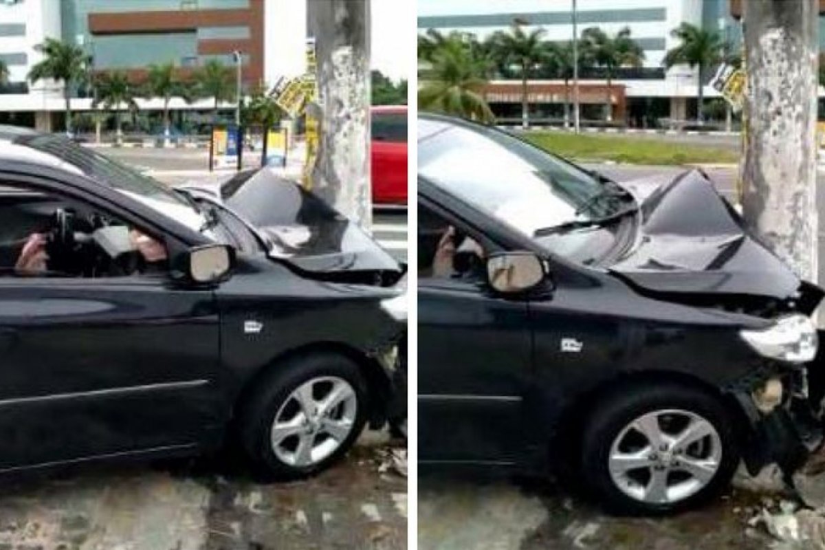 Motorista bate em poste e carro fica com dianteira destruída na Estrada do Coco