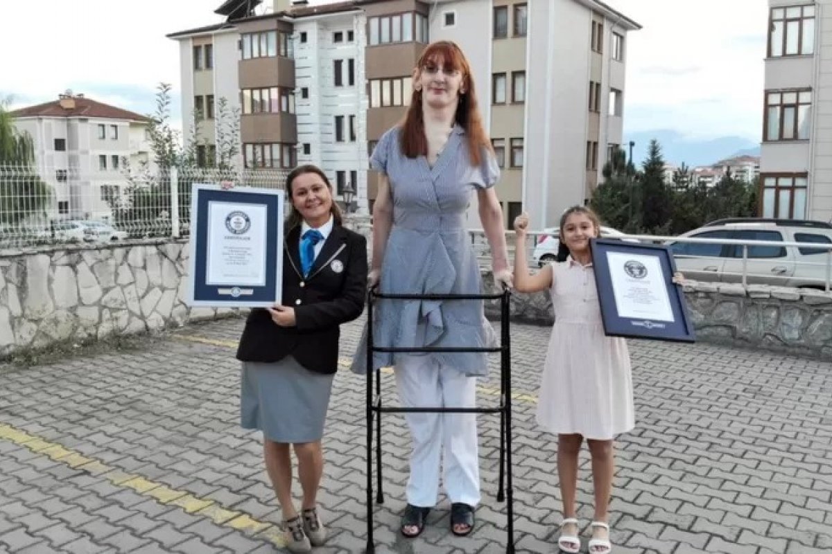 Guinness Book: mulher mais alta do mundo fatura mais três recordes
