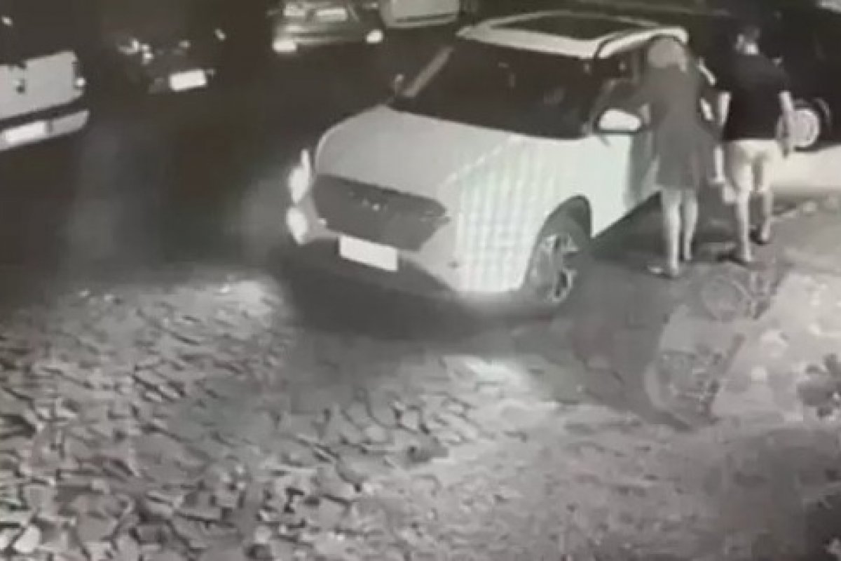 Vídeo mostra momento em que tesoureiro do PT atira pedras contra policial penal