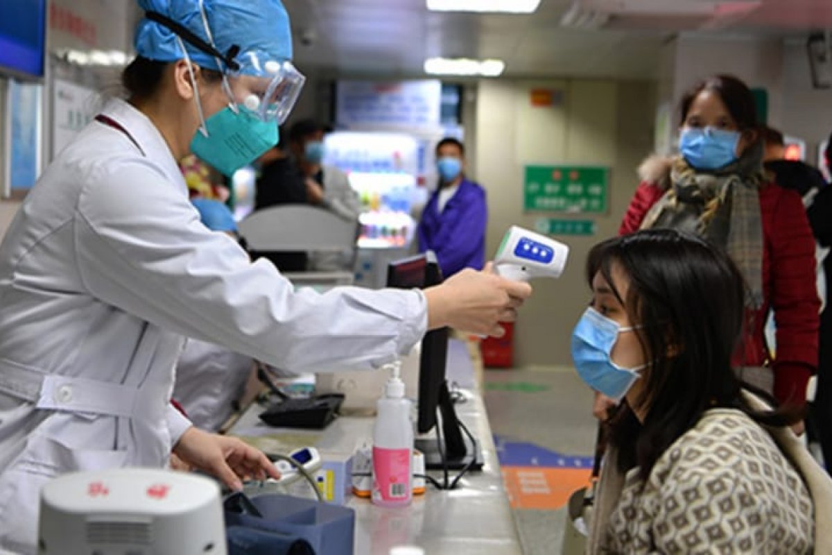 Nova onda da Covid-19 sobrecarrega crematórios em Pequim, na China