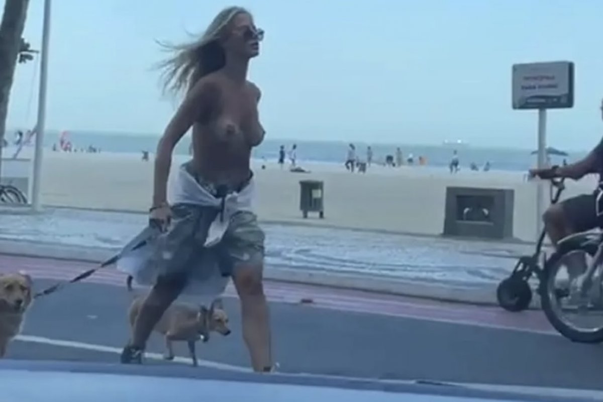 Mulher de topless é detida enquanto passeava com cachorros em Balneário Camboriu