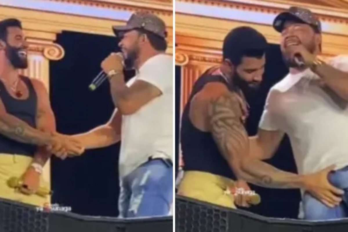 Veja vídeo: Gusttavo Lima agarra parte íntima de cantor durante show!