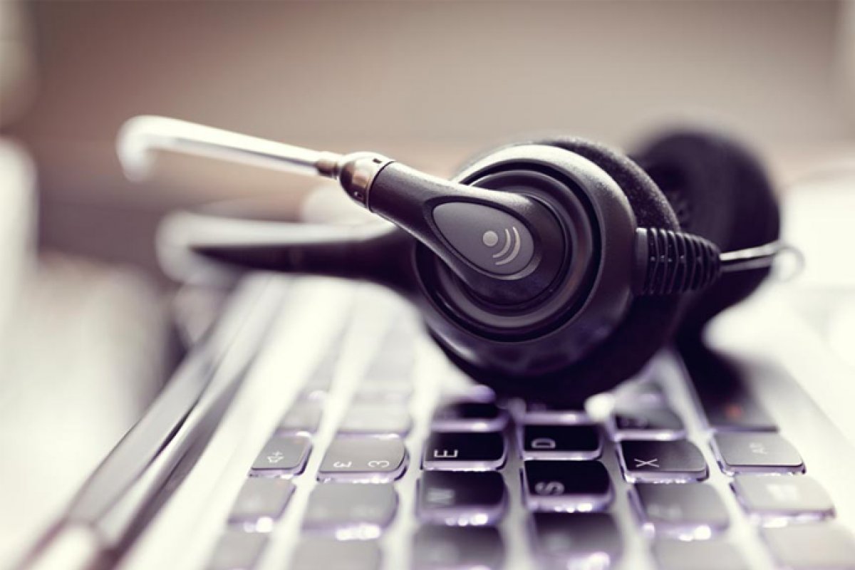 Empresa de call-center é condenada a pagar indenização por não tratar atendente trans por nome social