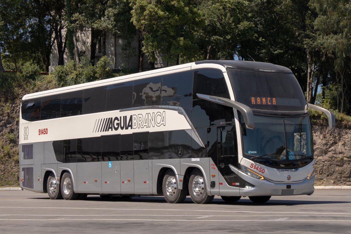 Viação Águia Branca, em parceria com a Marcopolo, lança ônibus comemorativos que resgatam pinturas históricas com assinatura de Hans Donner!