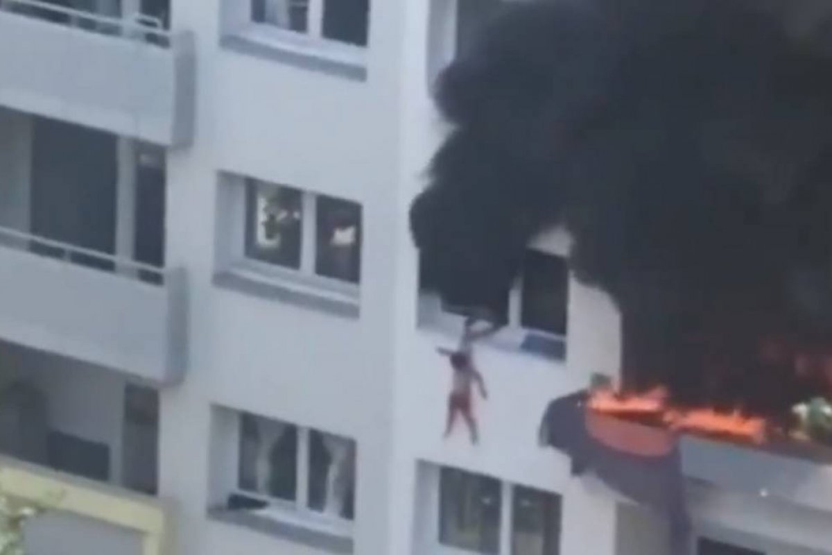 Veja vídeo: crianças pulam de prédio após incêndio