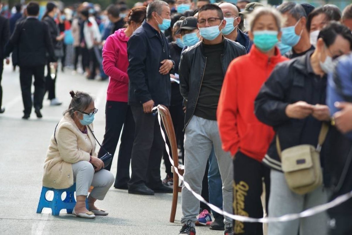 Covid-19: cidade chinesa irá testar 9 milhões de pessoas em cinco dias