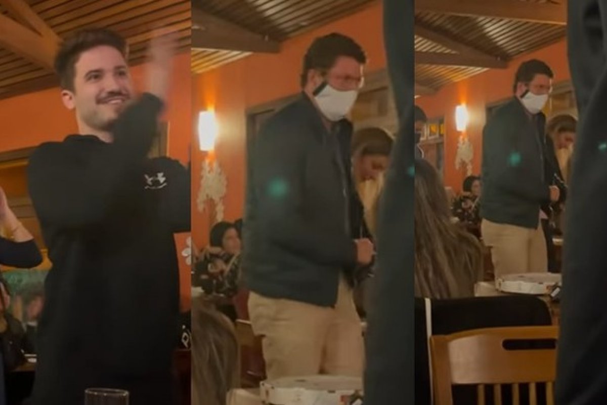 Vídeo: humorista sobe em mesa de pizzaria para ironizar a presença de Ricardo Salles 