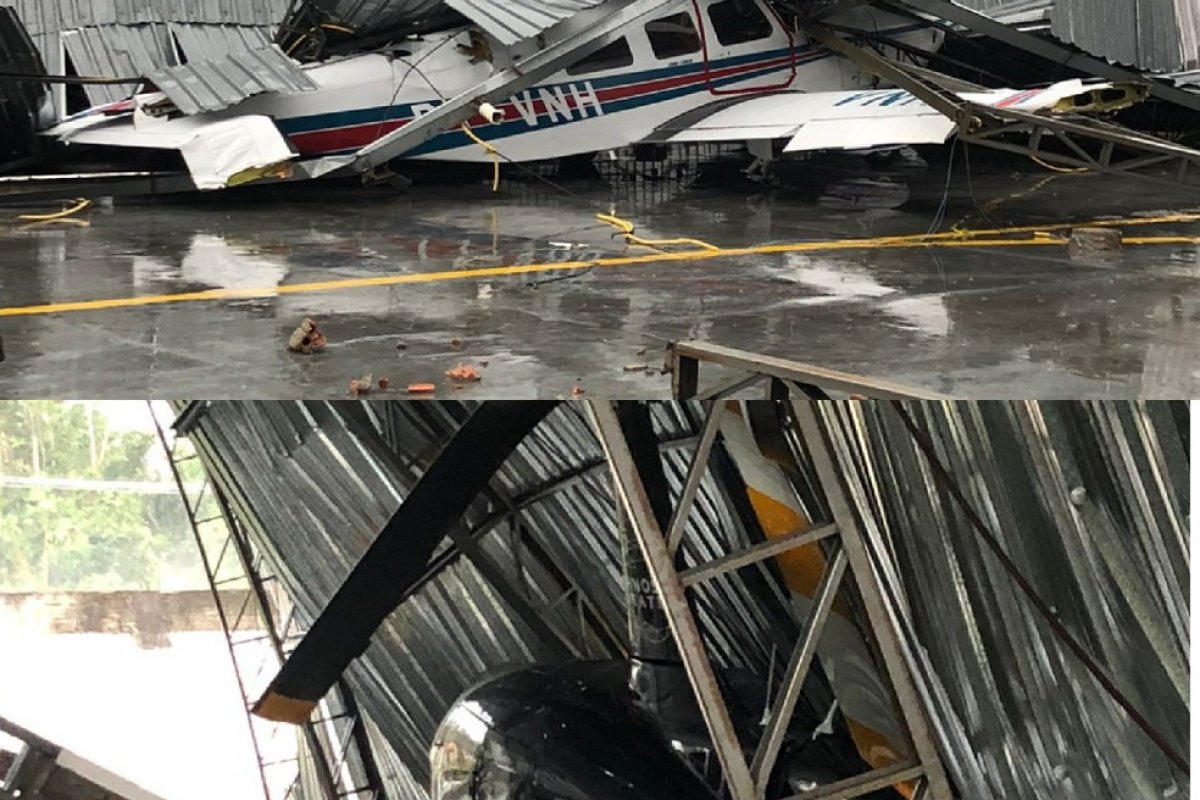 Vídeos: Temporal derruba cobertura de hangar em cima de avião e helicóptero no interior do Acre