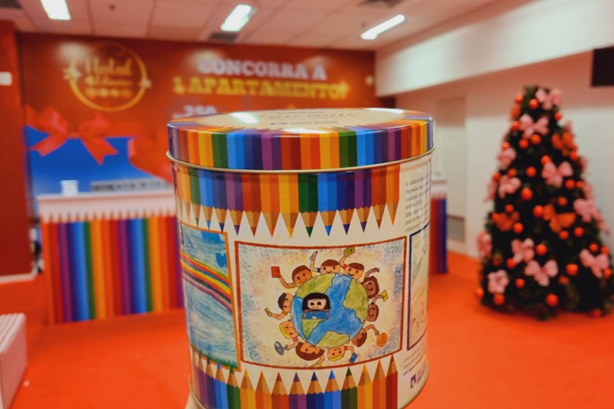 Arte em lata! Shopping Bela Vista traz para o Natal panetone comemorativo com latas personalizadas por crianças da OSID